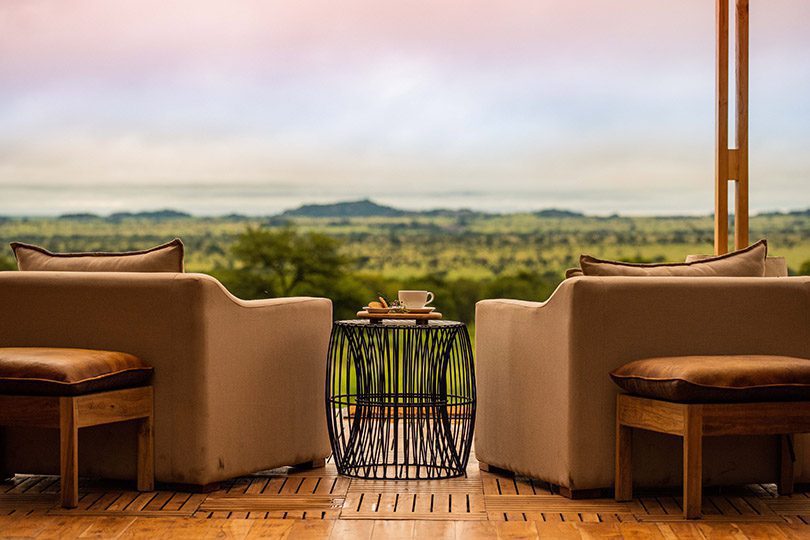 Dunia-Tea-time-with-view-from-the-main-area-deck-onto-the-Serengeti